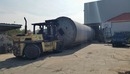 堆高機搬運加拖板車運送-巨型桶槽搬運